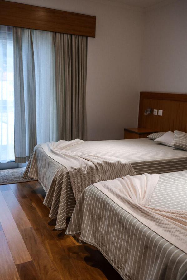 Hotel Comodoro Corvo Bagian luar foto